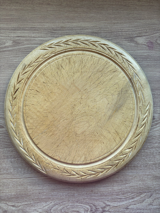 Old wooden carved bread board
