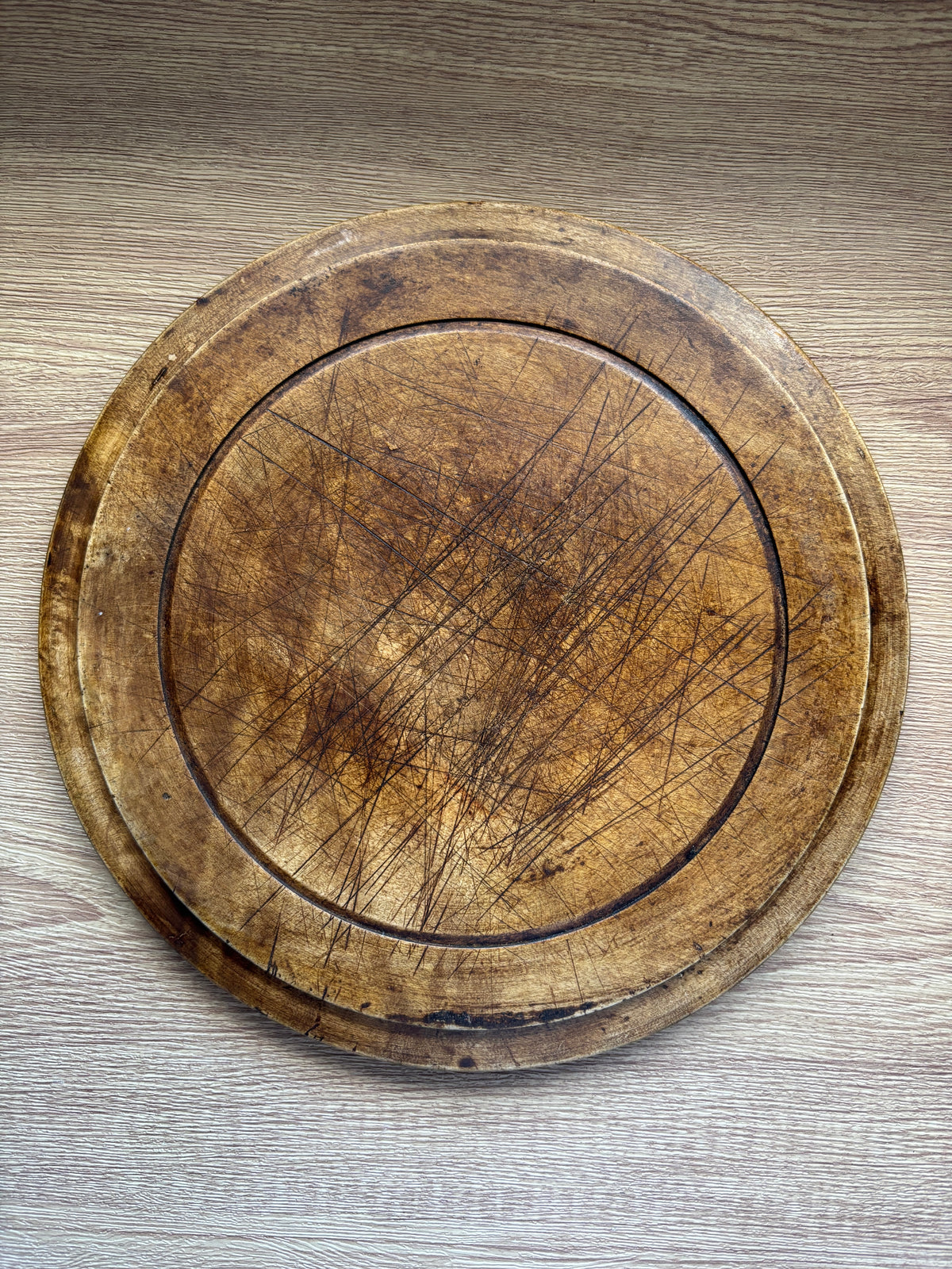 Old wooden carved bread board