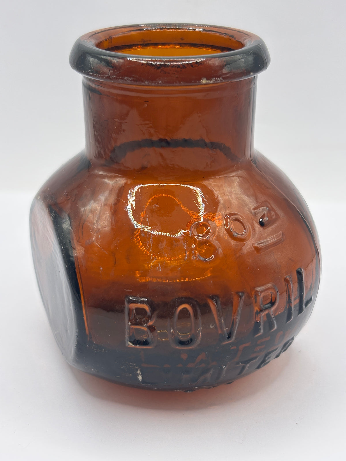 Old 8oz amber glass advertising Bovril bottle