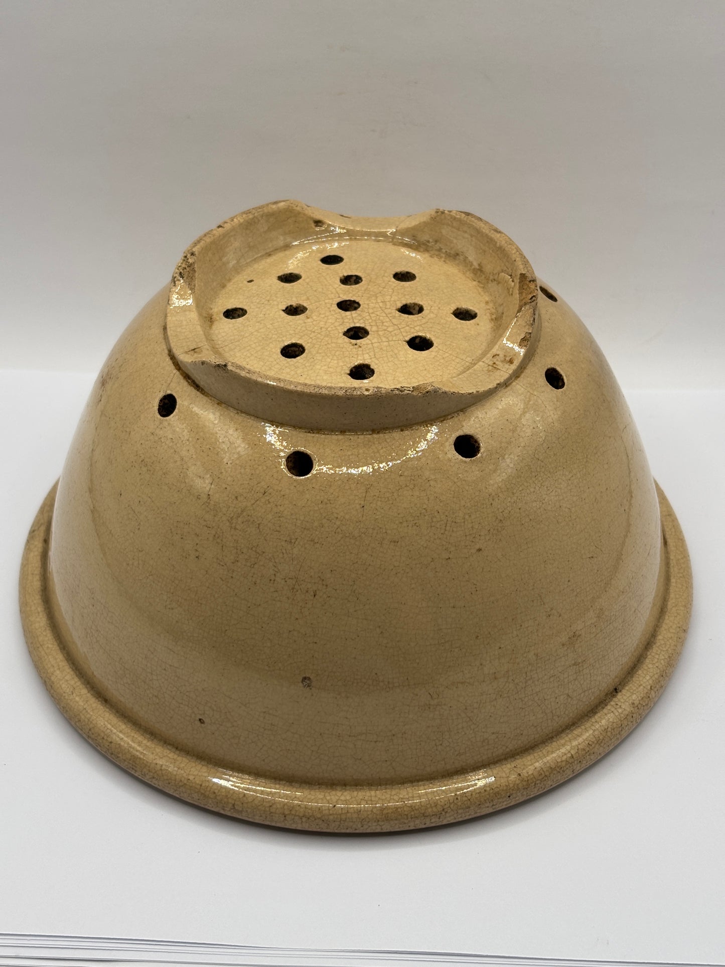 Old English stoneware strainer, crazed