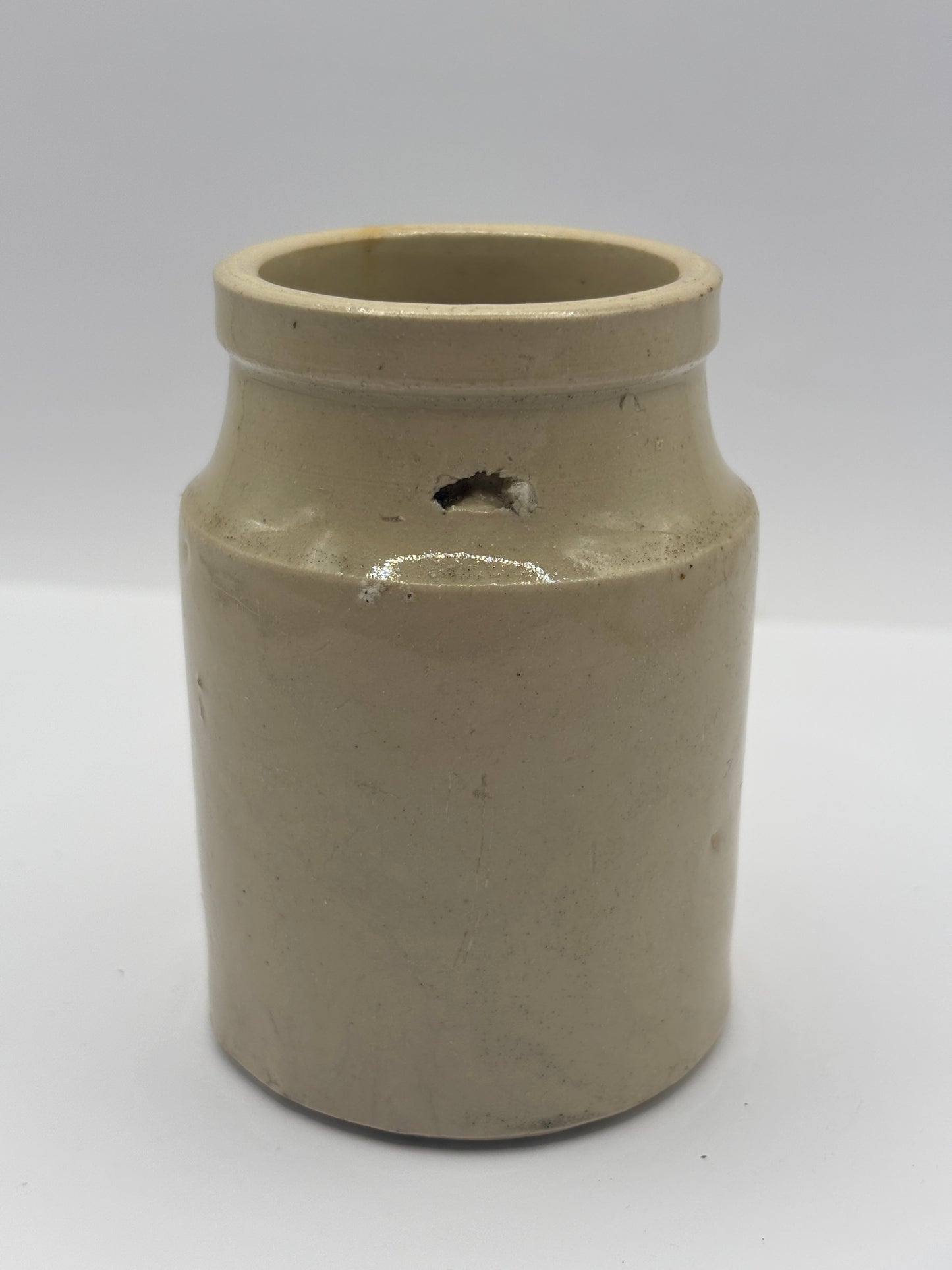 Old stoneware mustard pot. Chippy