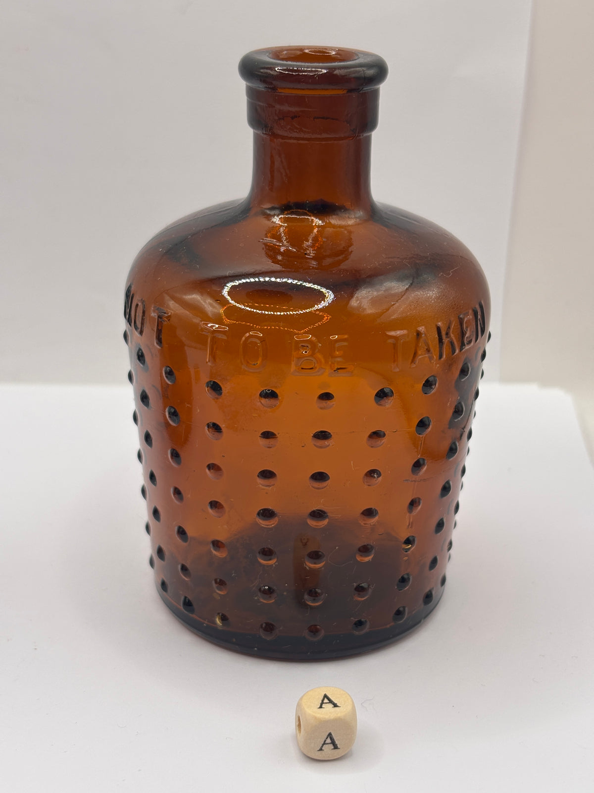 old amber glass Lysol bottle, Not to be taken 11cms (a)