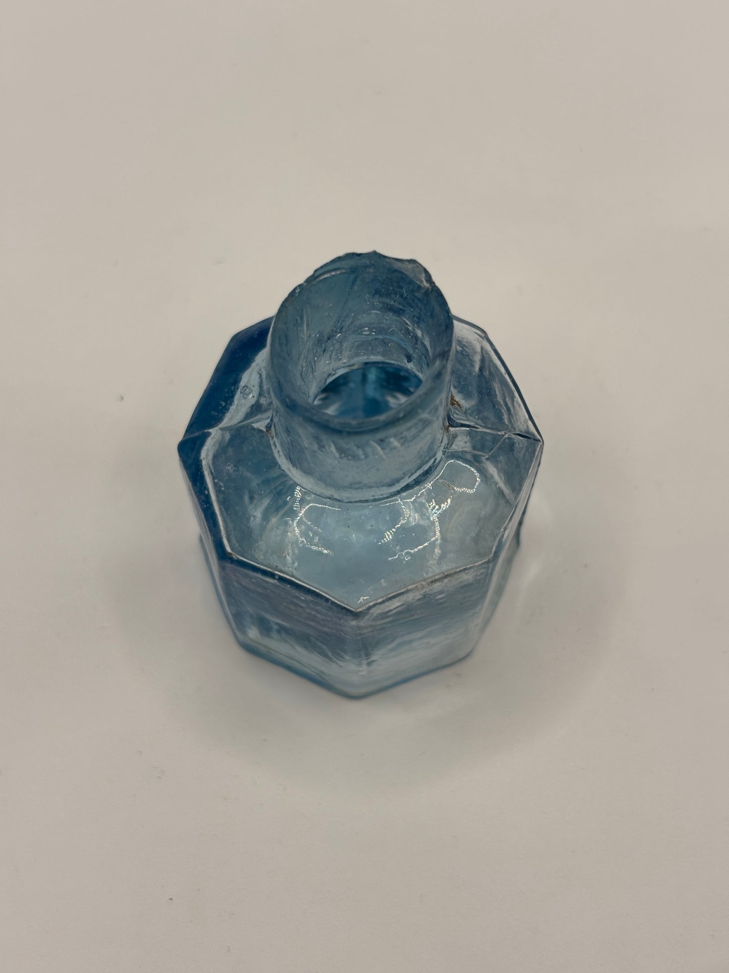 Old ice blue inkwell, ink bottle