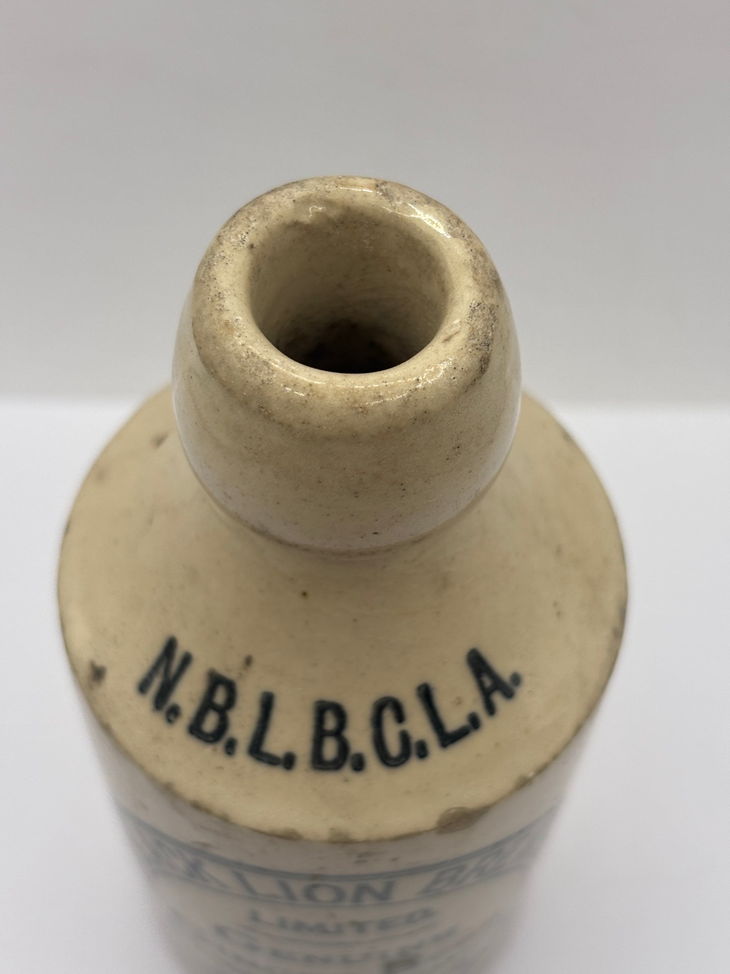 Old stoneware ginger beer bottle, New black lion brewery Co. Aberdare
