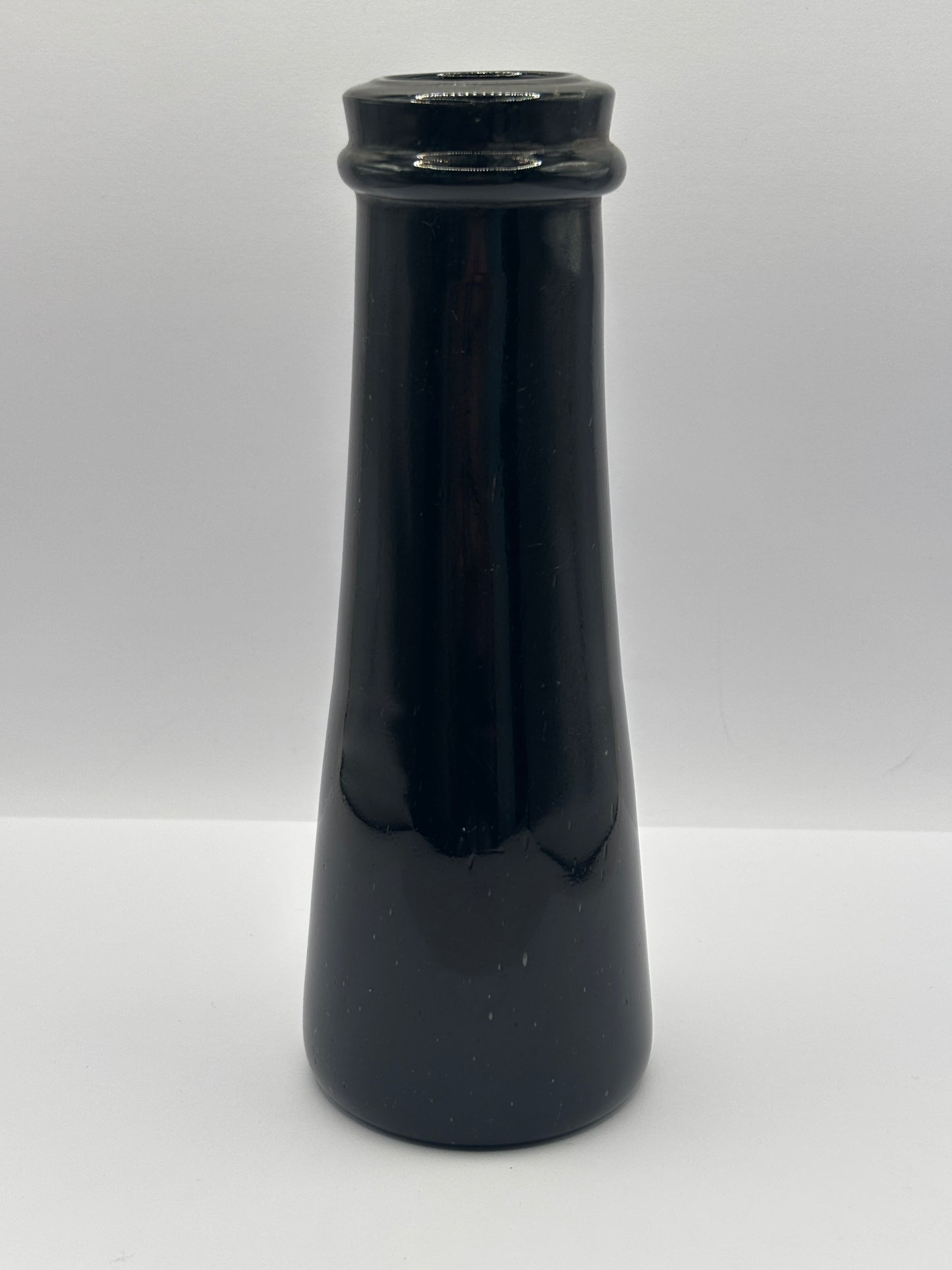 Old black glass truffle jar