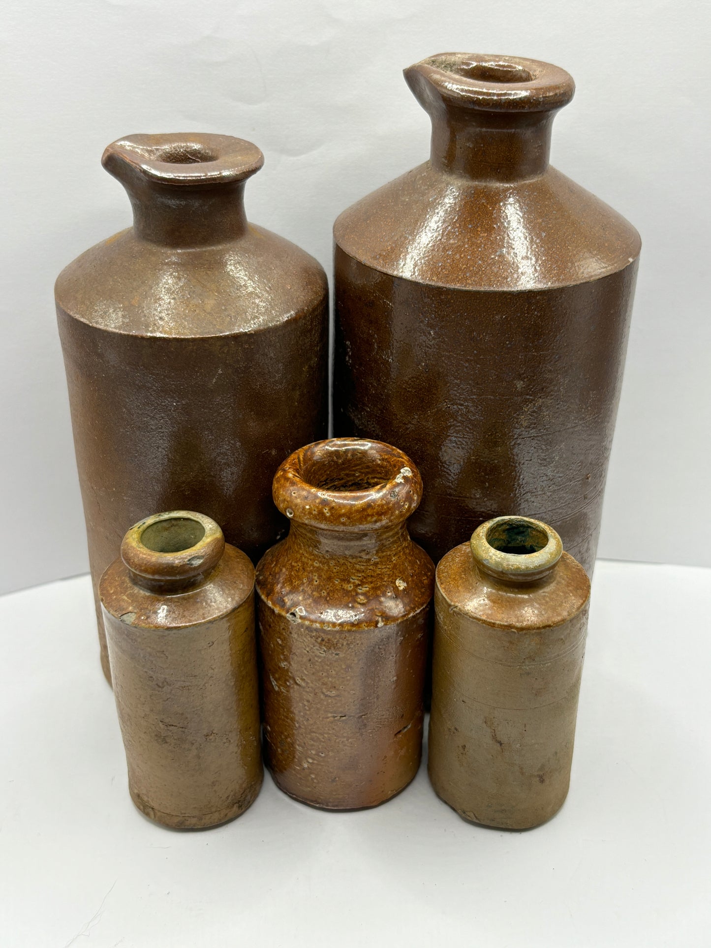 5 old brown stoneware pots