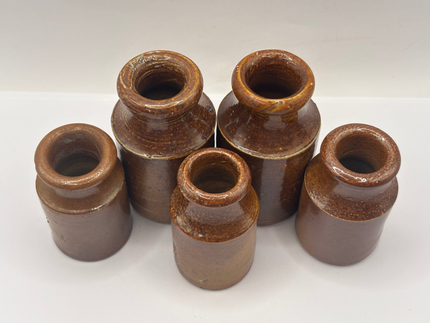 5 old small brown stoneware pots