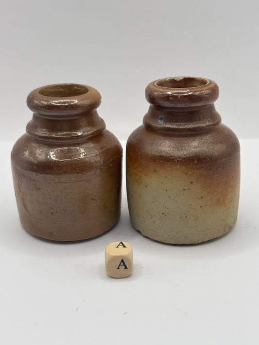2 brown stoneware inkwells, ink bottles (a)