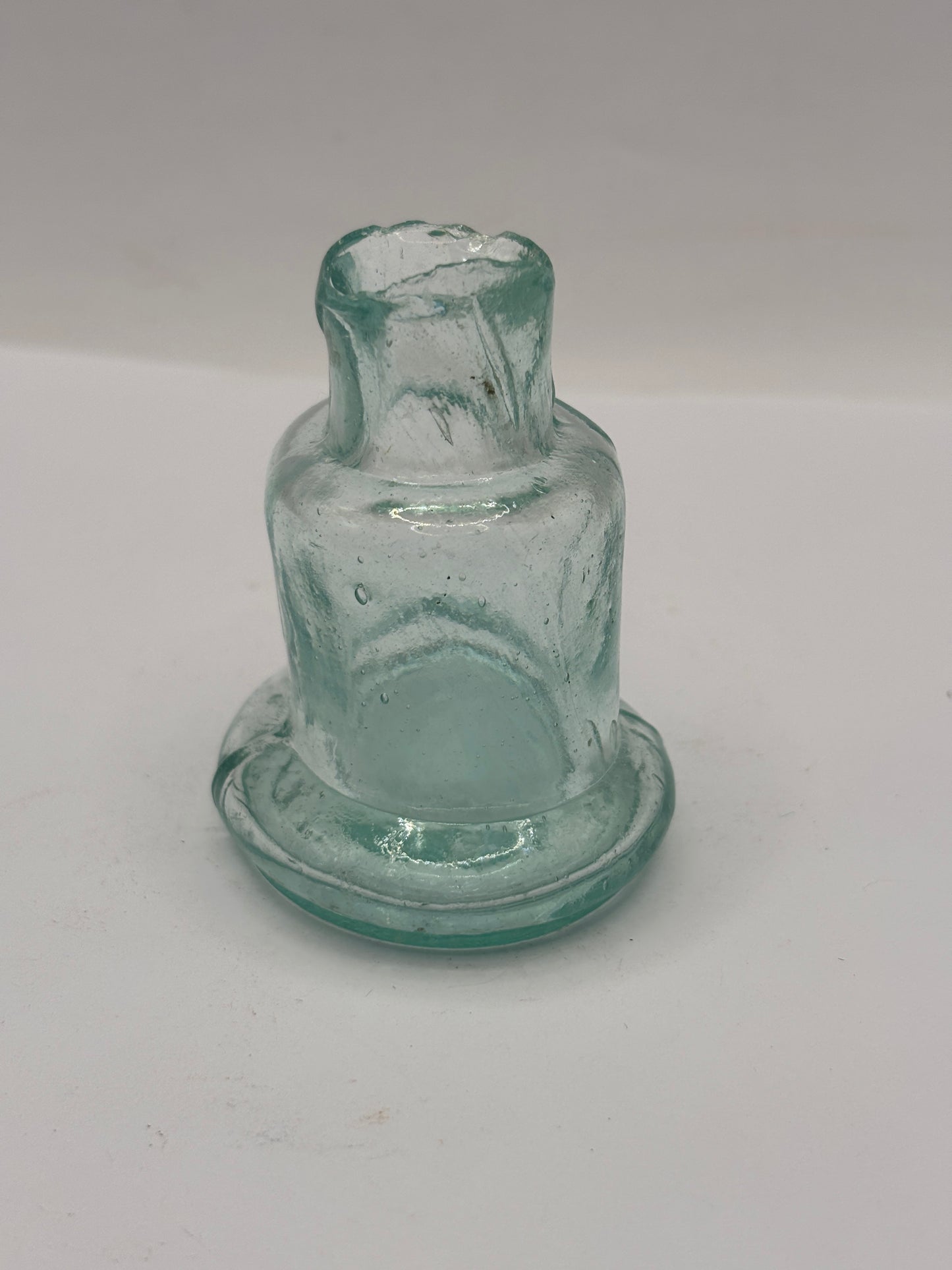 Old aqua glass inkwell, Bell ink. Ink bottle