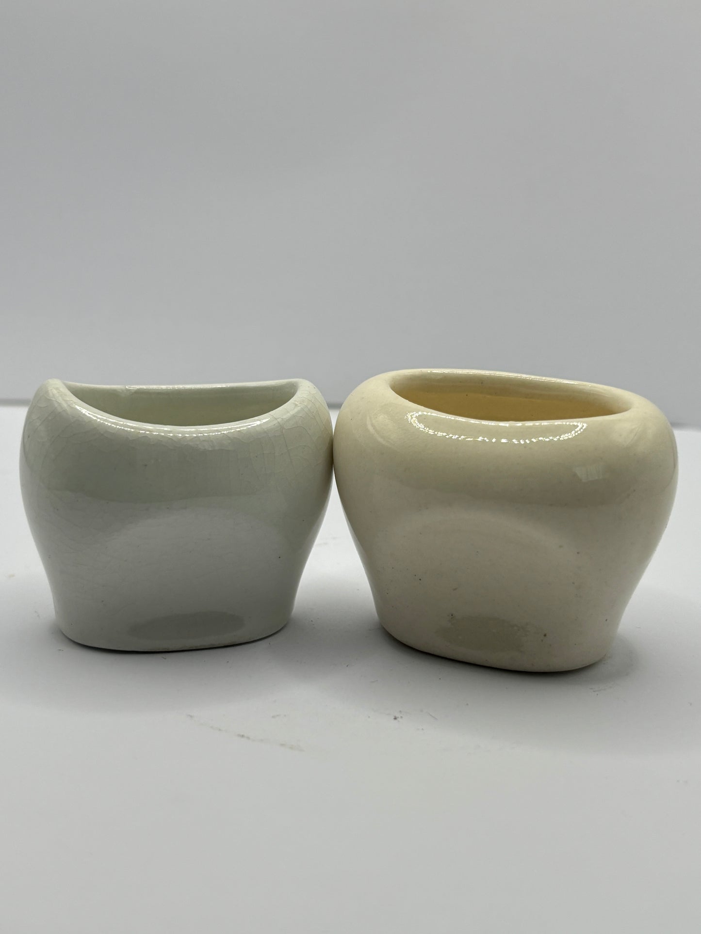 2 White porcelain eye baths