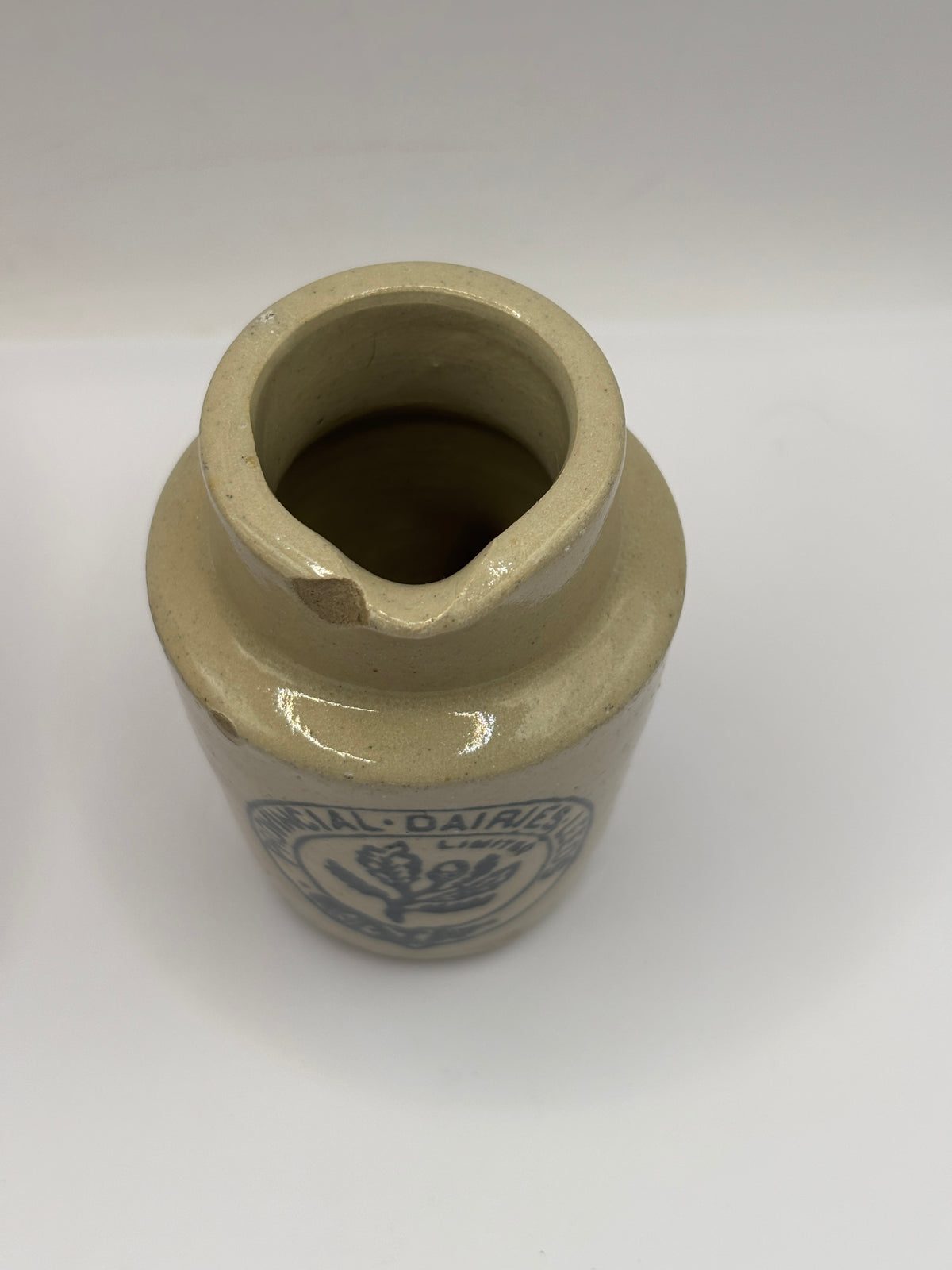 Old advertising cream pot, Provinical dairies Leeds. Chipped