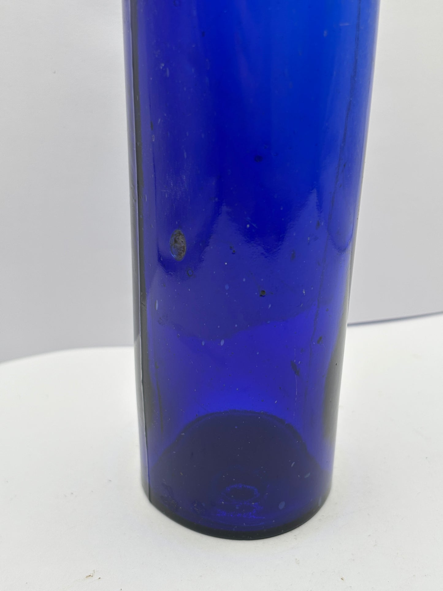 Tall blue castor oil bottle 24cms