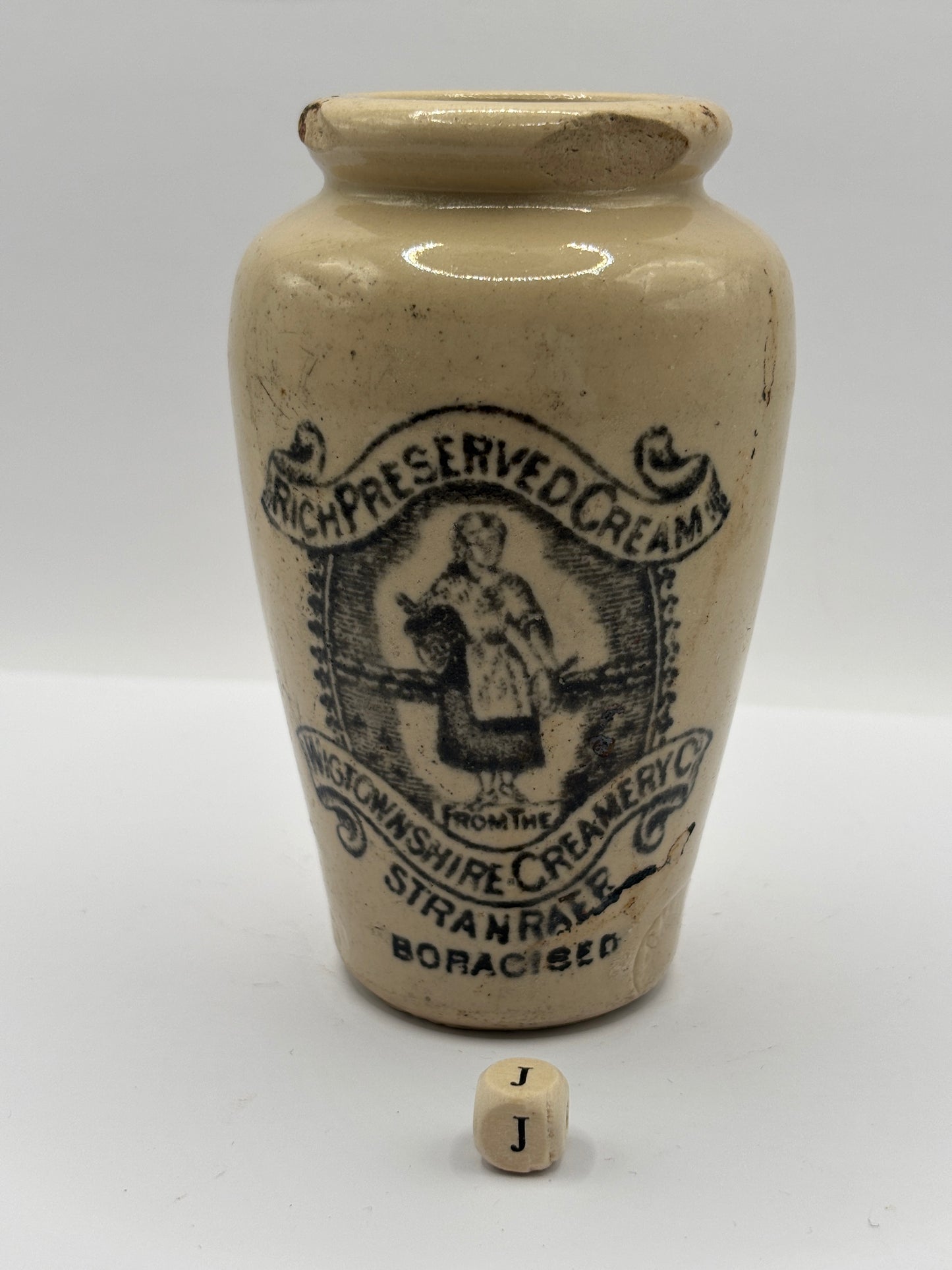 Old advertising cream pot, Rich preserved cream, Stranraer. Milk maid (J) damaged