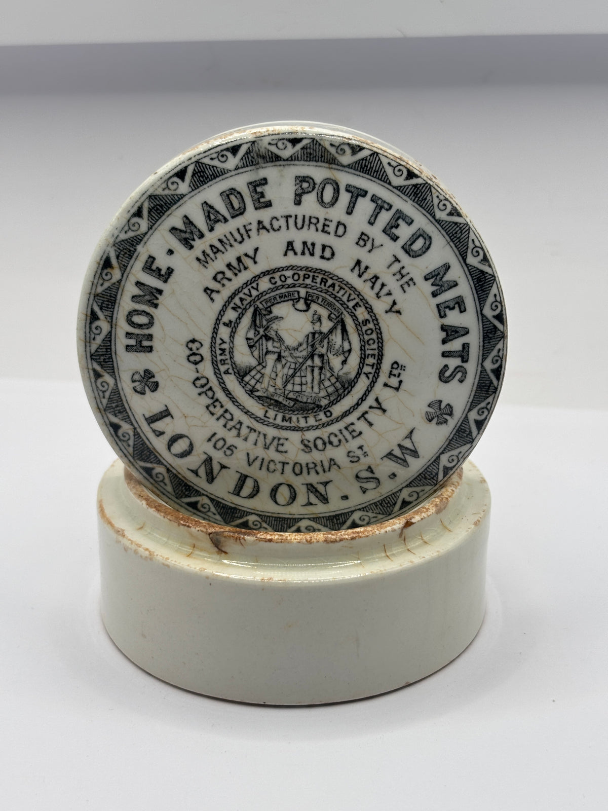 Old advertising lid and base. Army & Navy cooperative society home made potted meats