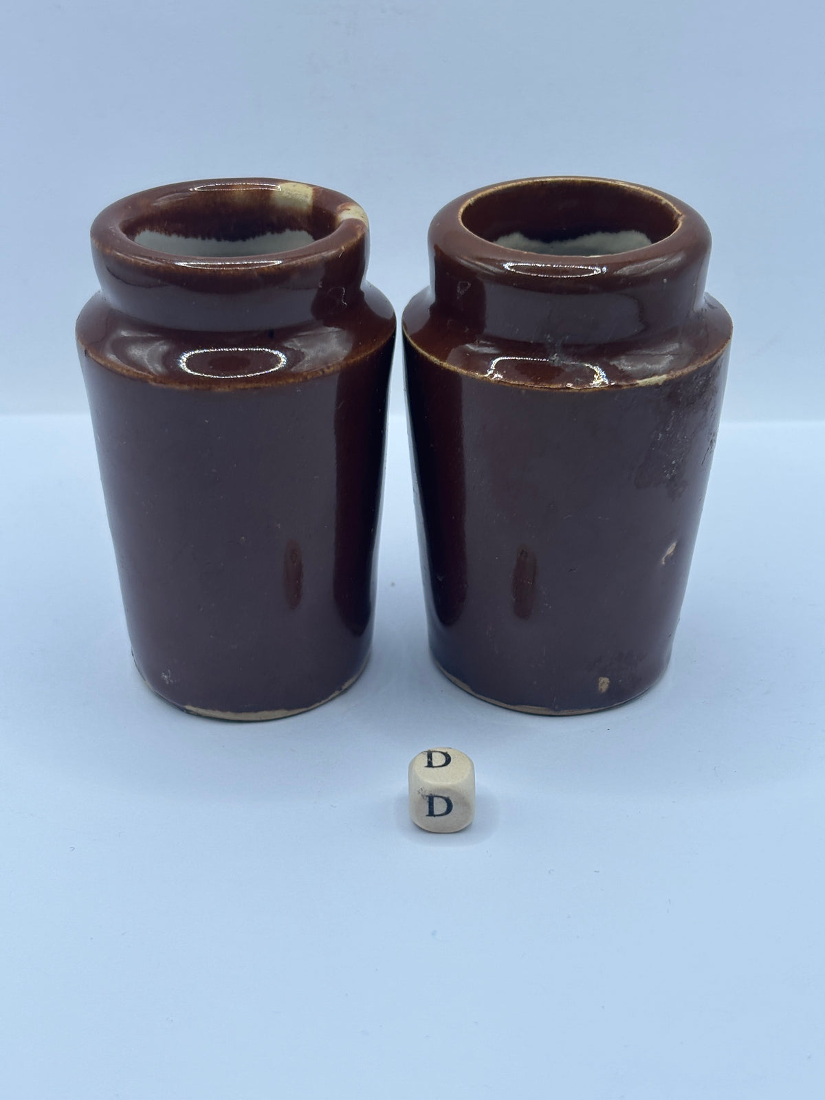 2 Old brown stoneware cream pots (D)