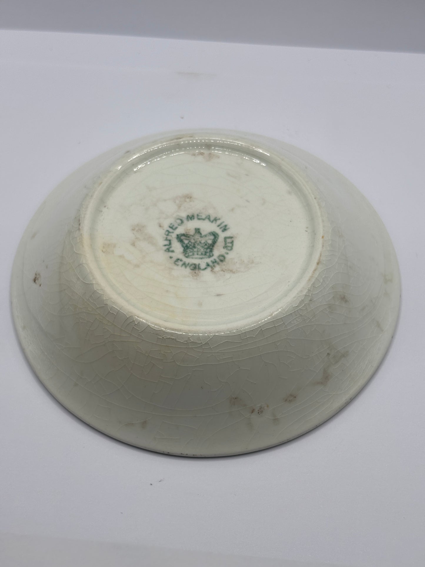 Old stained & crazed plate/saucer