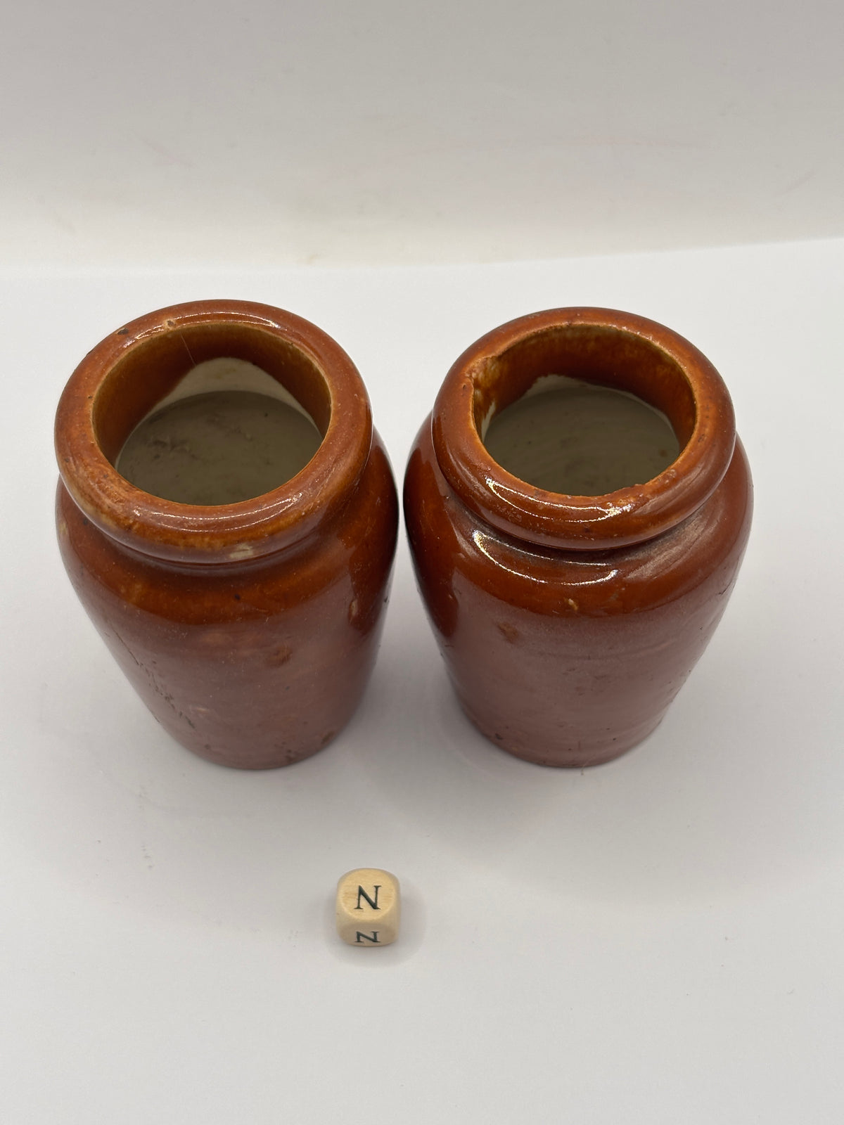 2 Old brown stoneware cream pots (N)