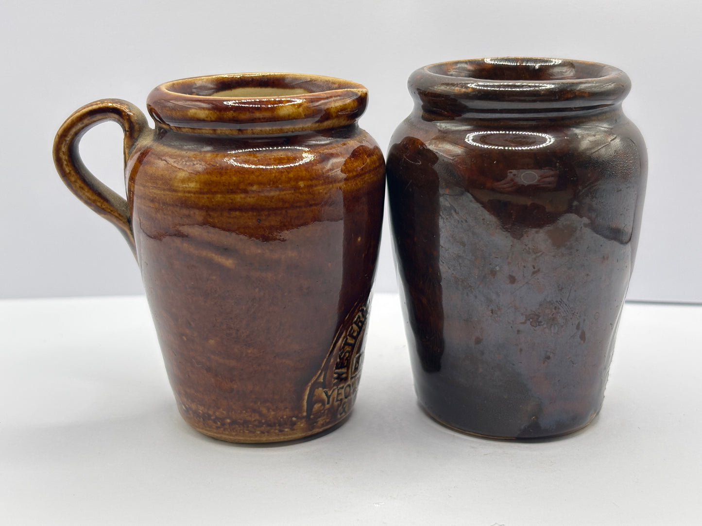 2 old West counties creamery cream pots