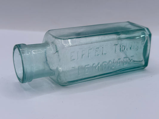 Old aqua glass advertising bottle, Eiffel tower Lemonade