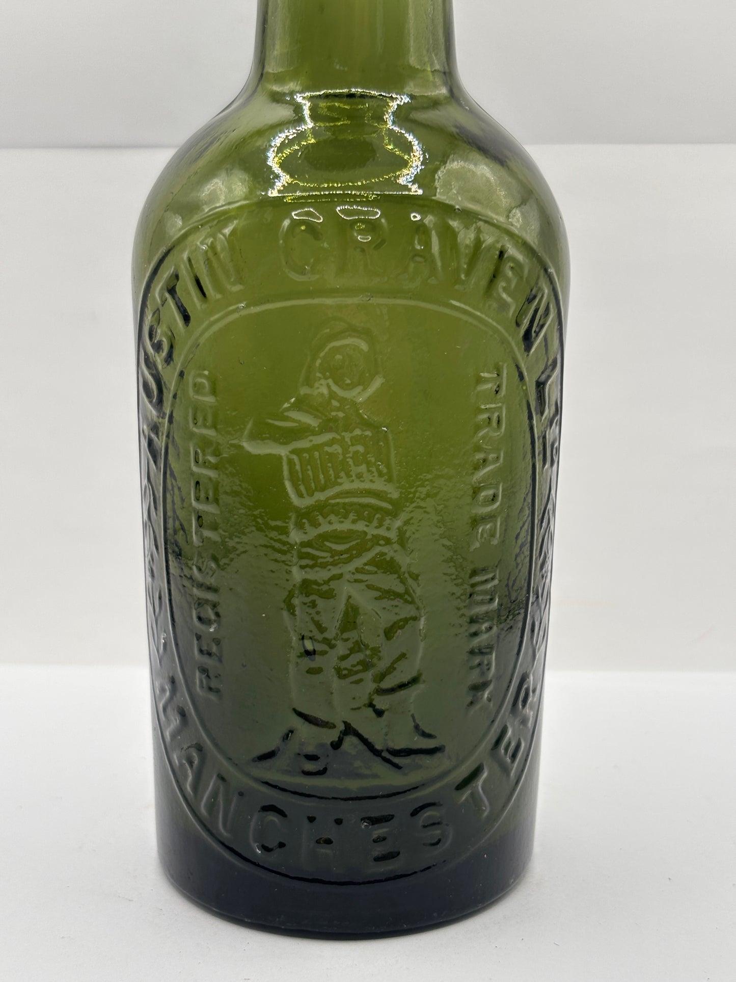 Old advertising green glass beer bottle, Austin Craven Manchester