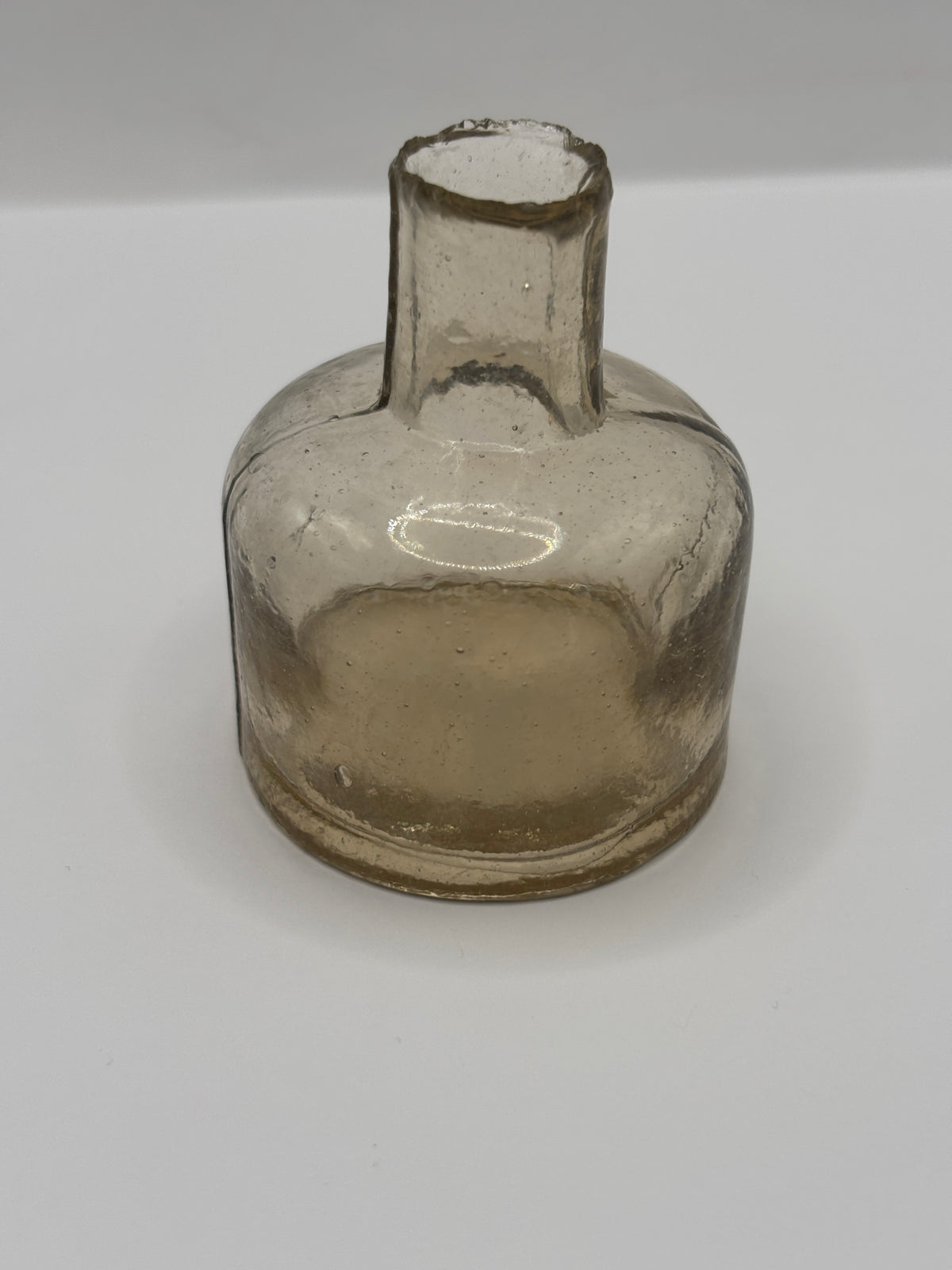 Old glass ink, inkwell, peachy coloured