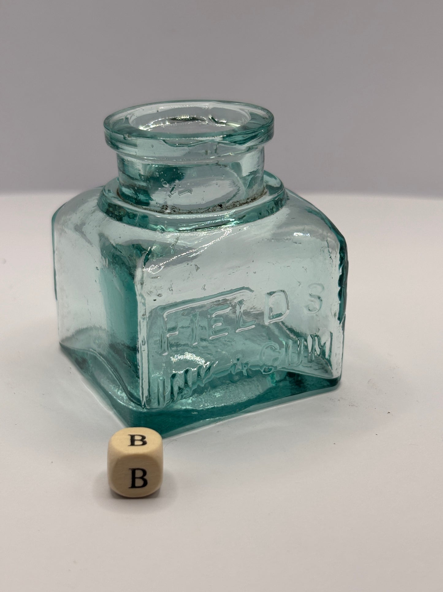 Old aqua glass ink bottle, inkwell. fields ink & gum (B)