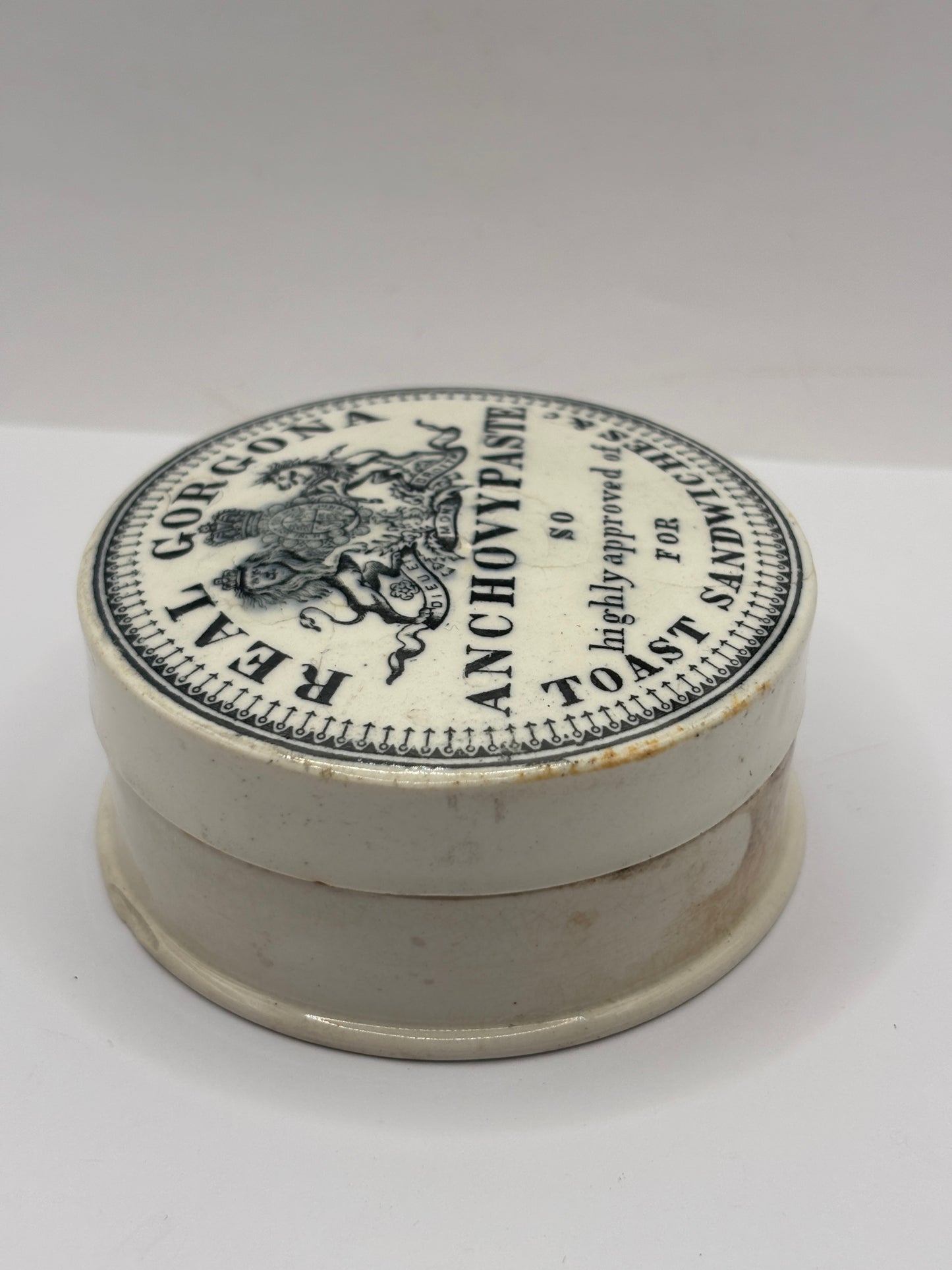 Old advertising lid and base. Real Gorgona anchovy paste. Chipped