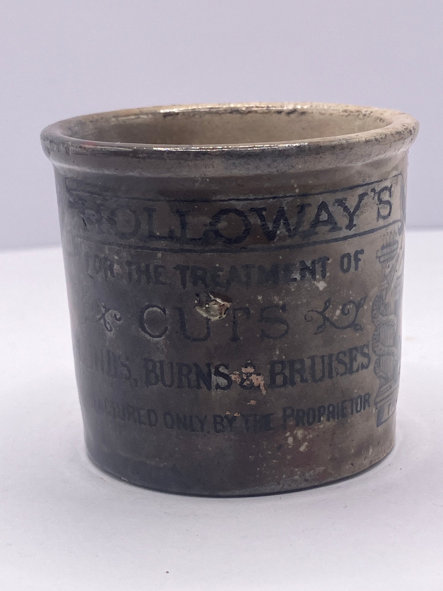 Large size super stained Holloway’s advertising ointment pot