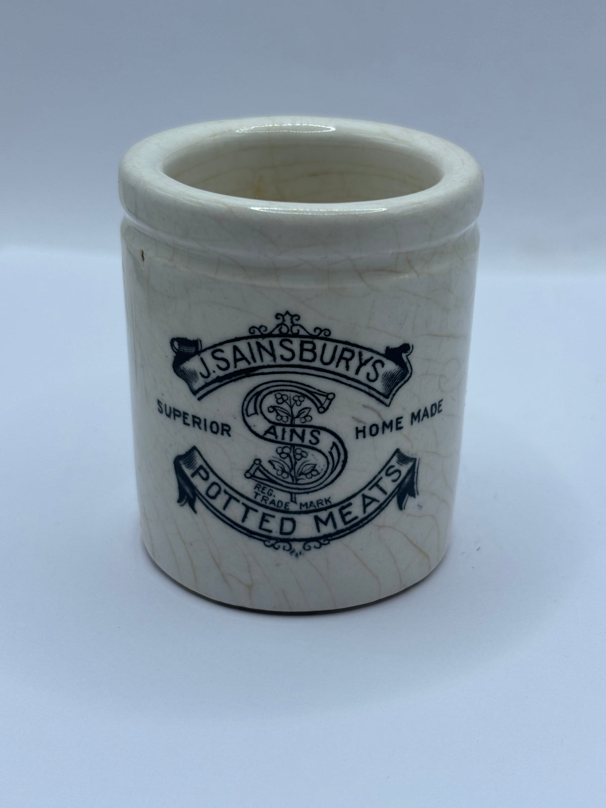 Old stoneware advertising jar, Sainsburys potted meat