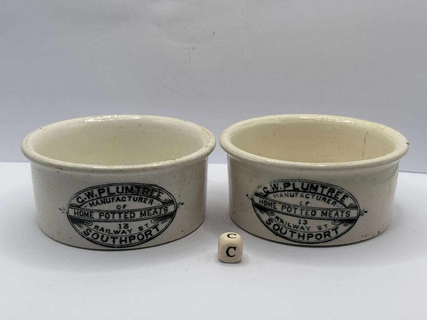 2 old advertising meat paste pots (c) chipped