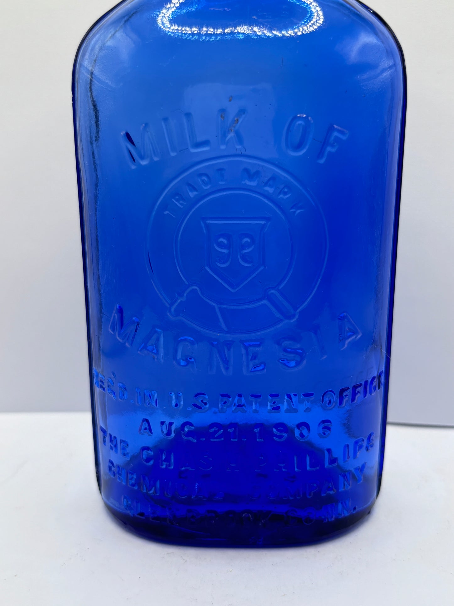 Old blue milk of magnesia bottle