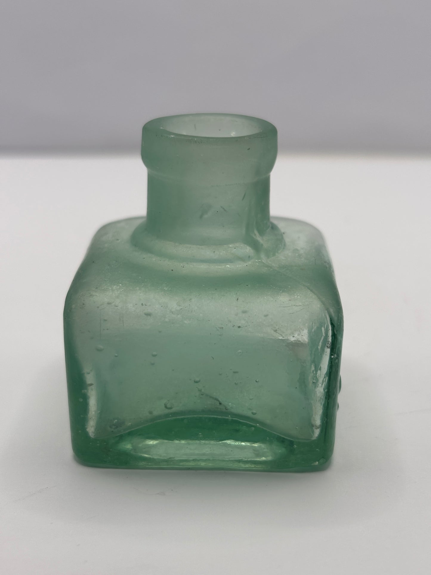 Old free sample inkwell, ink bottle