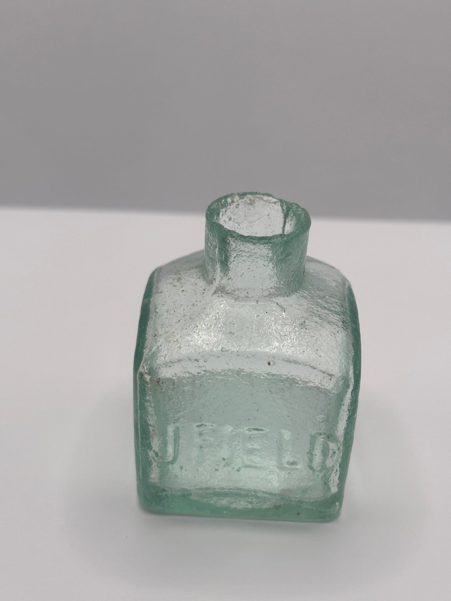 Old aqua glass advertising ink, ink bottle, inkwell. J.Field