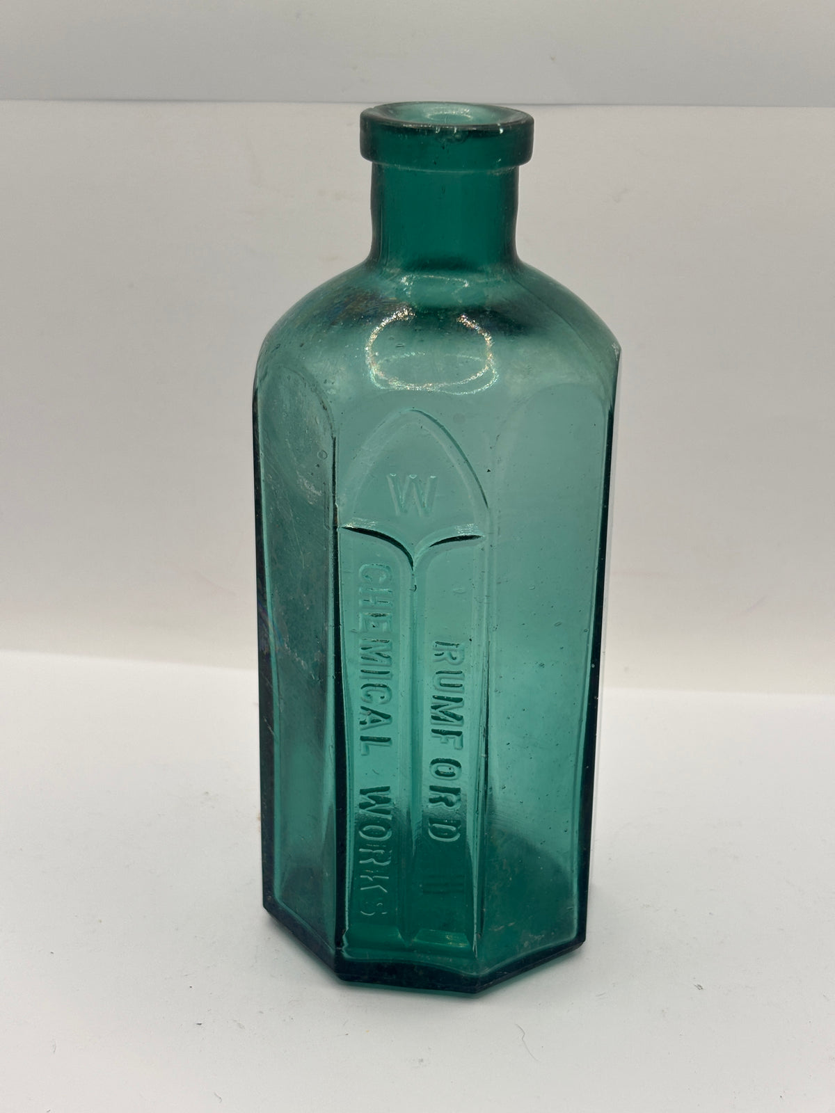 Old green advertising bottle, Rumford chemical works