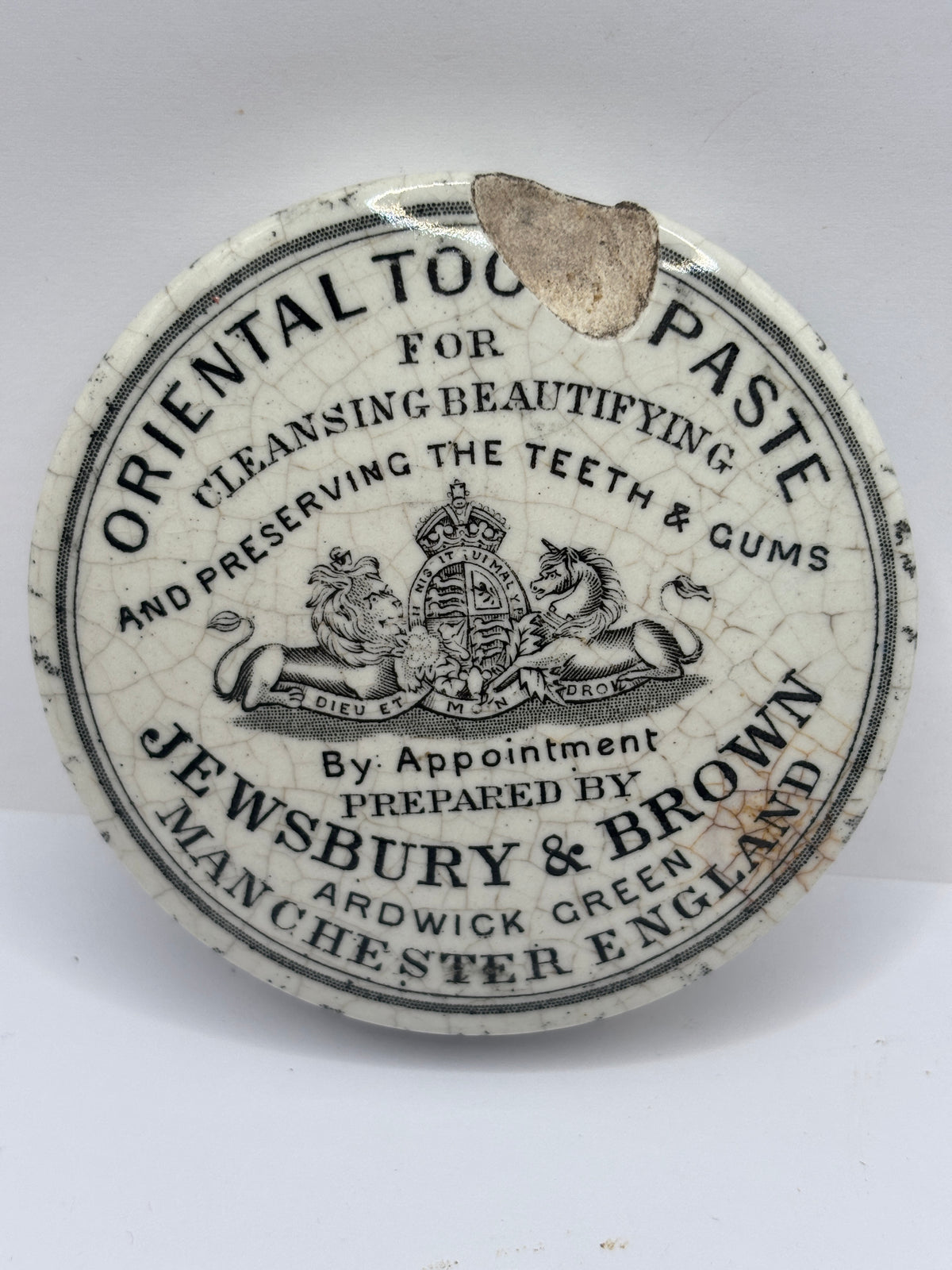 Old damaged lid, oriental toothpaste