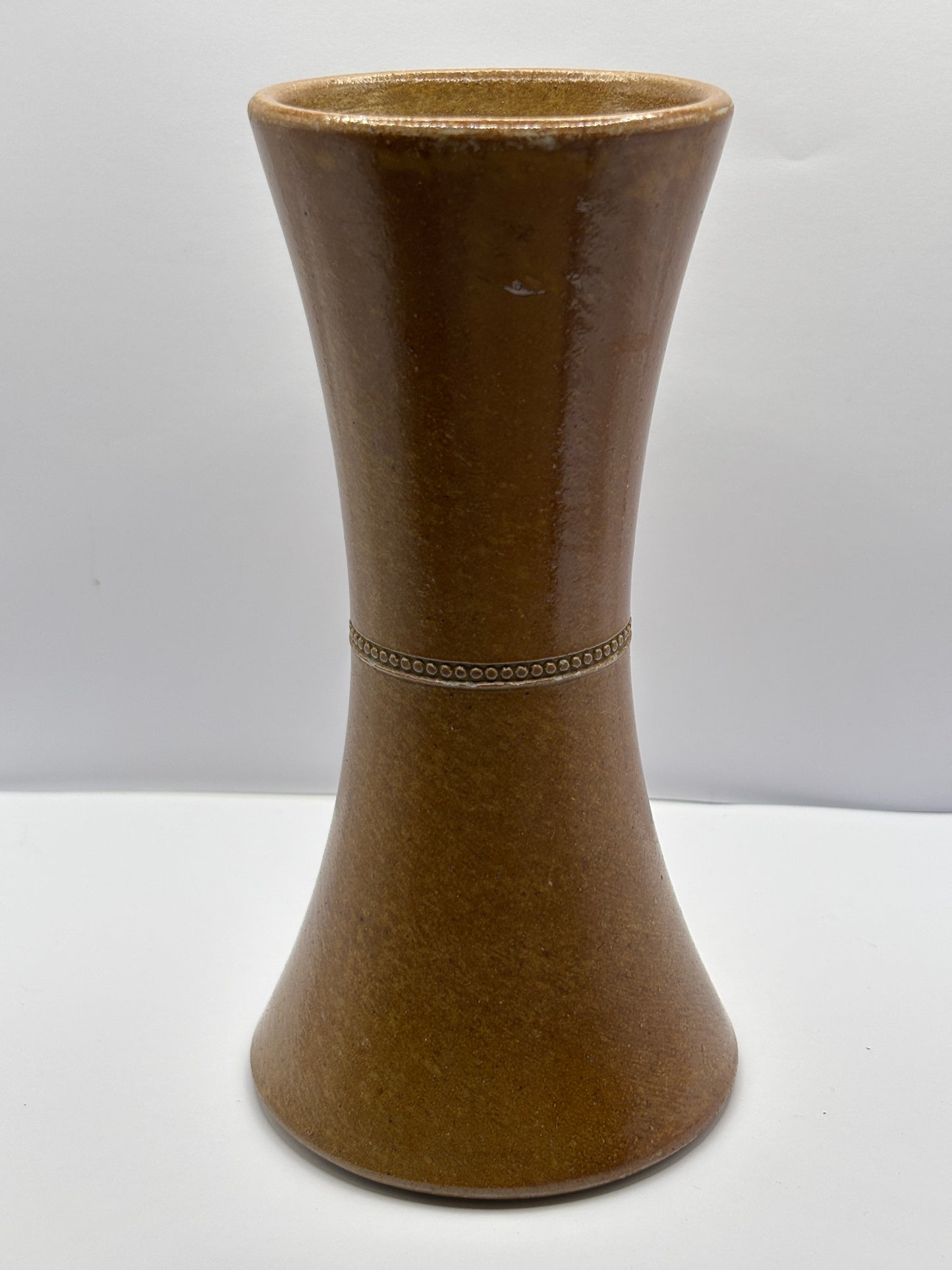 Old brown stoneware vase