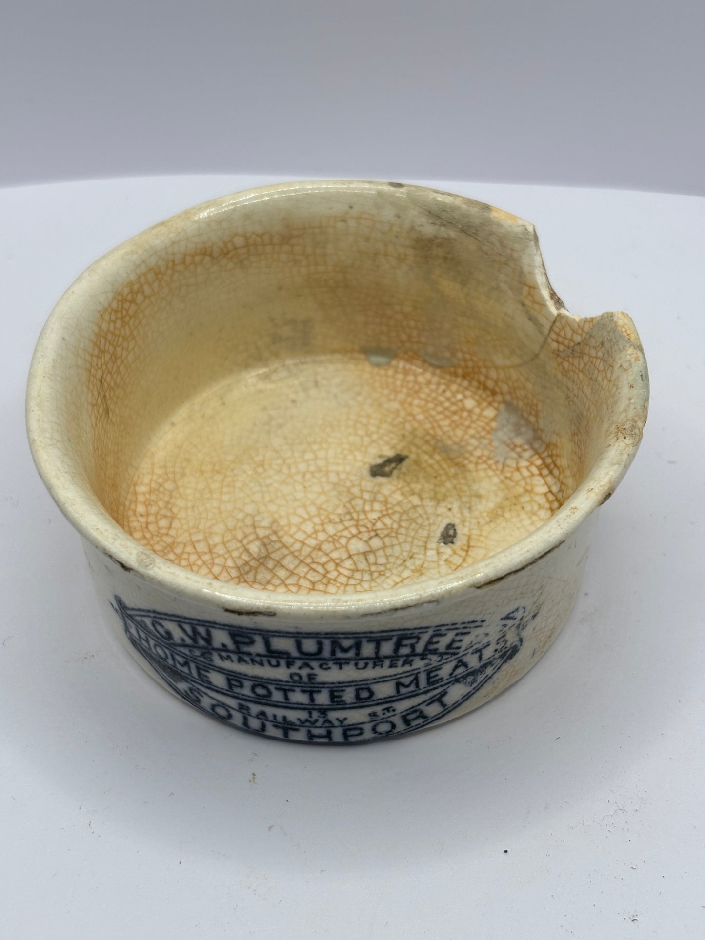 Plumtree home potted meats advertising pot. Damaged