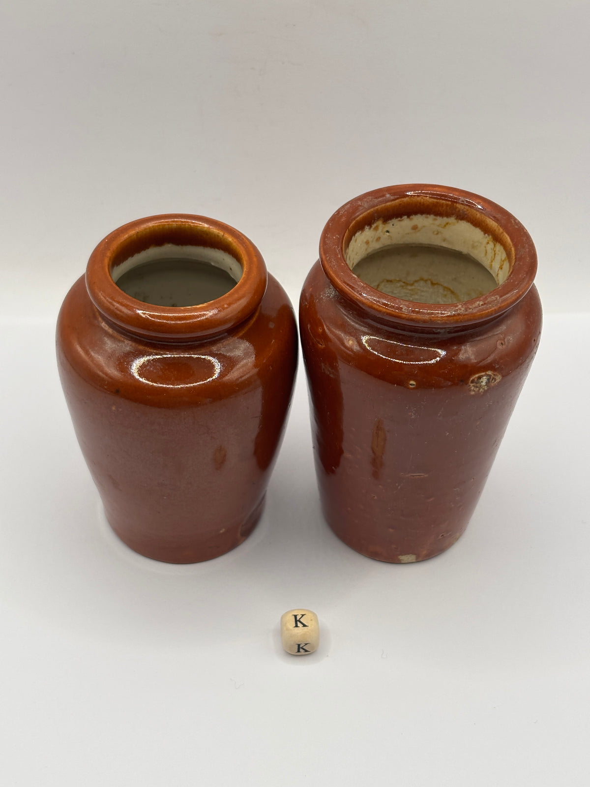 2 Old brown stoneware cream pots (K)