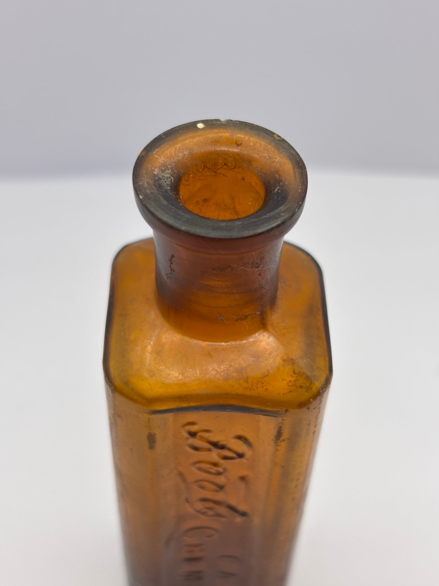 Old amber glass Boots cash chemists bottle