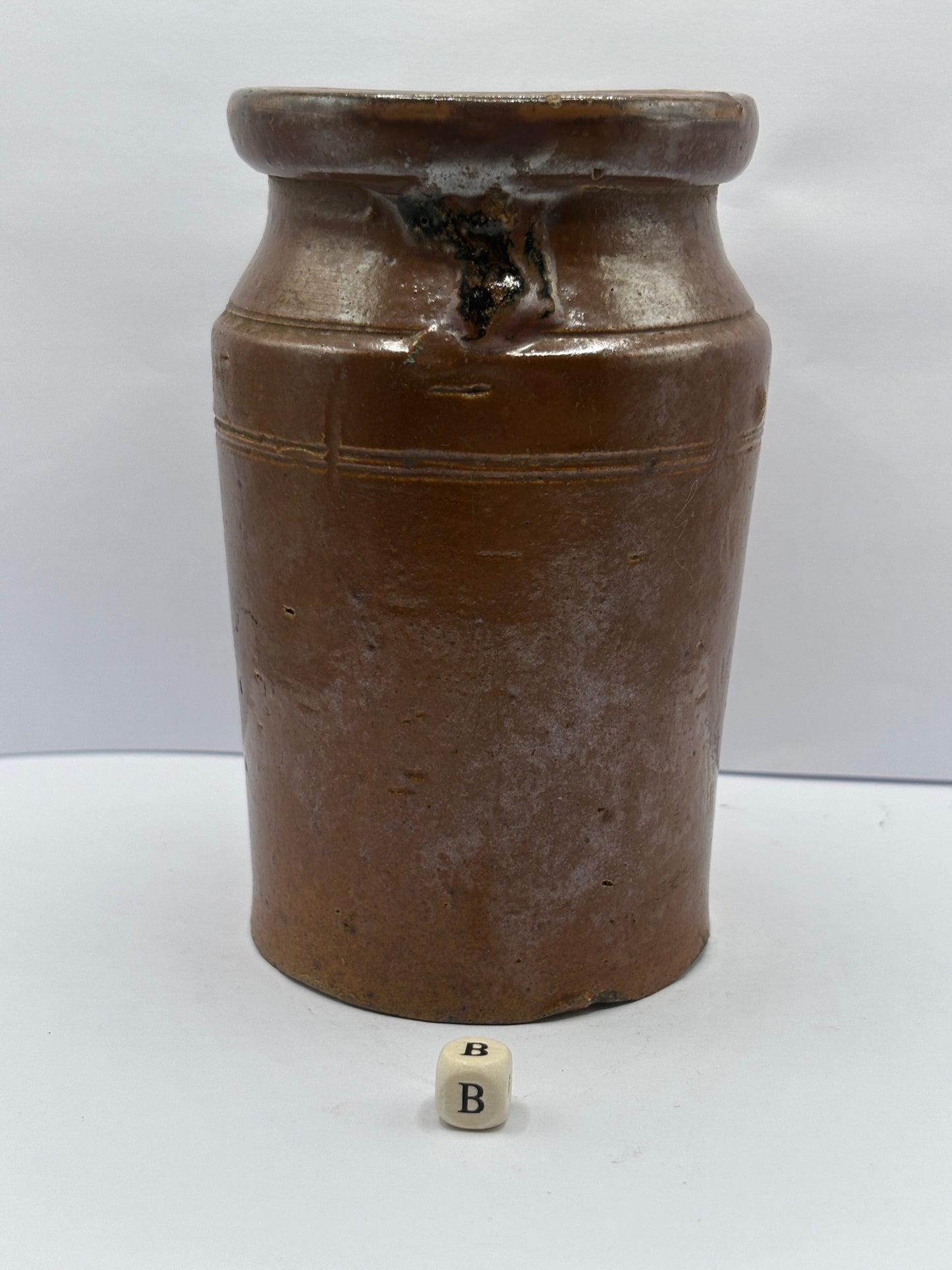 Old brown stoneware jar (B)