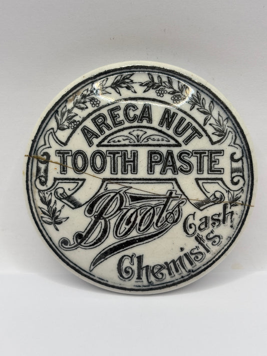 old advertising lid, areca nut tooth paste. Damaged