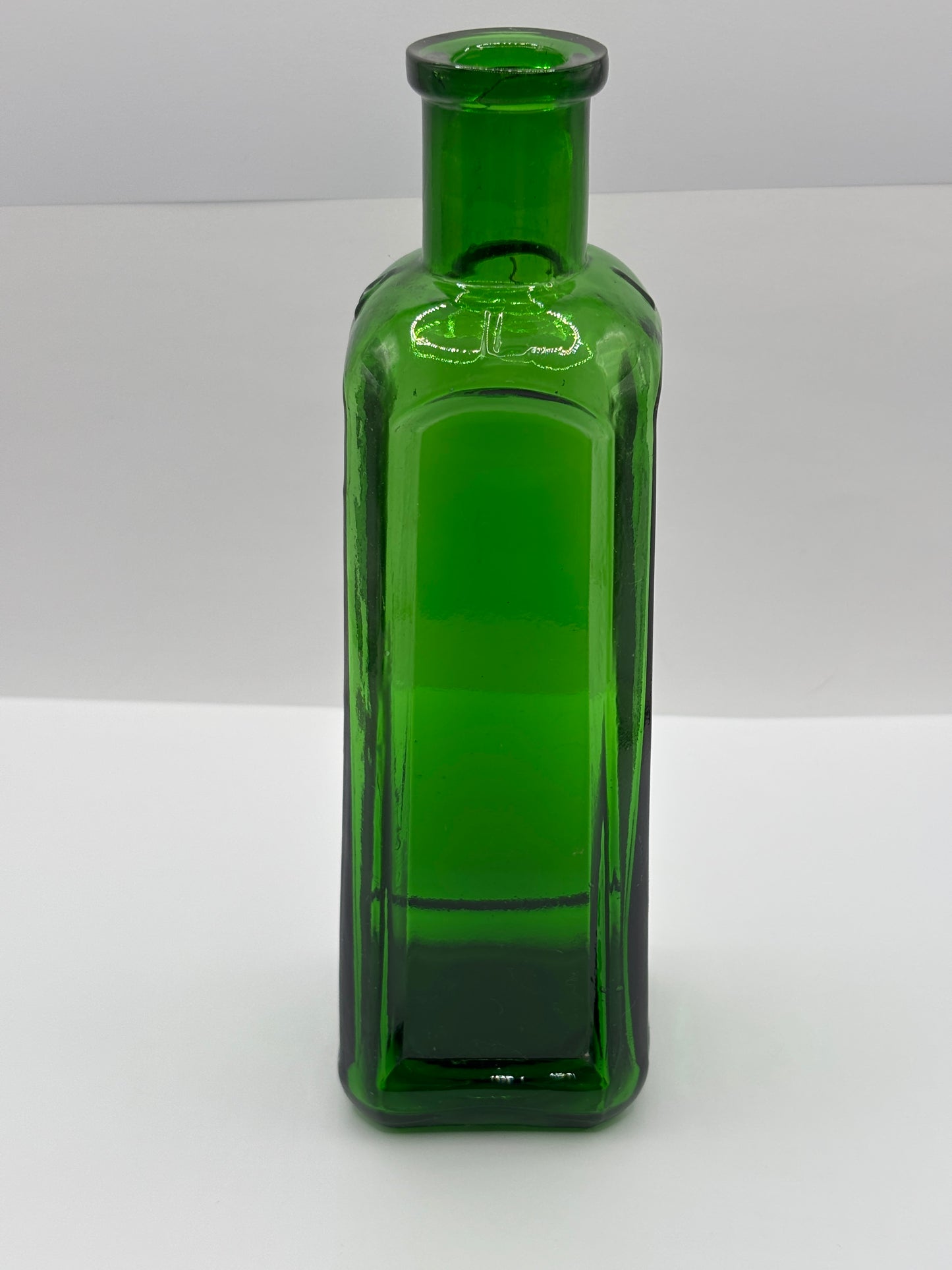 Old green glass Izal bottle