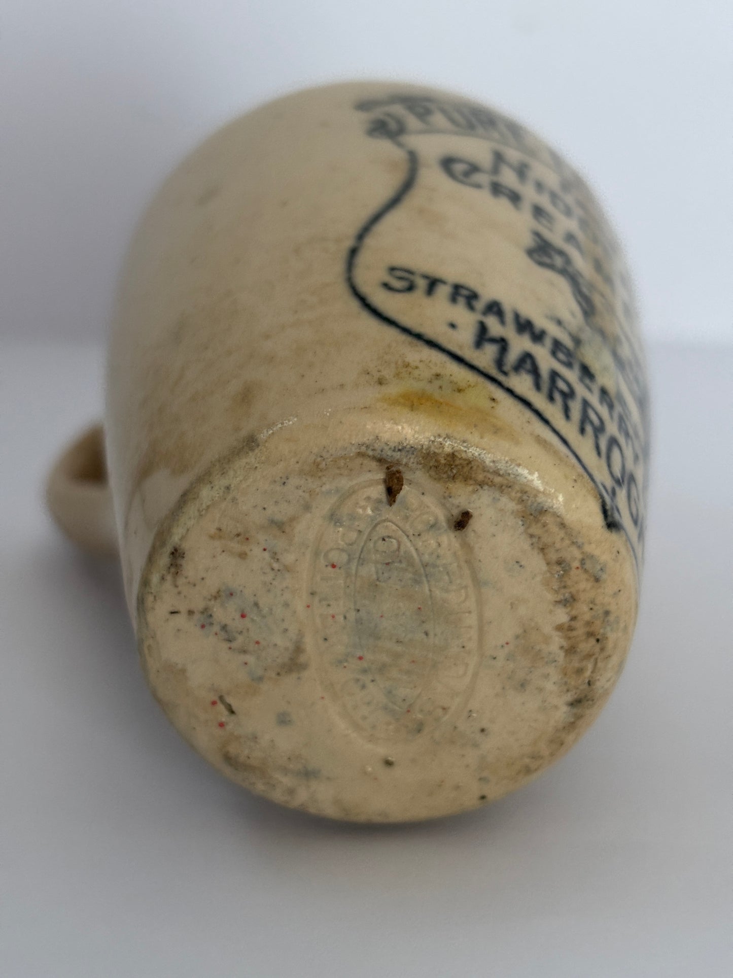 Old Nidderdale advertising cream pot, 7.5cms