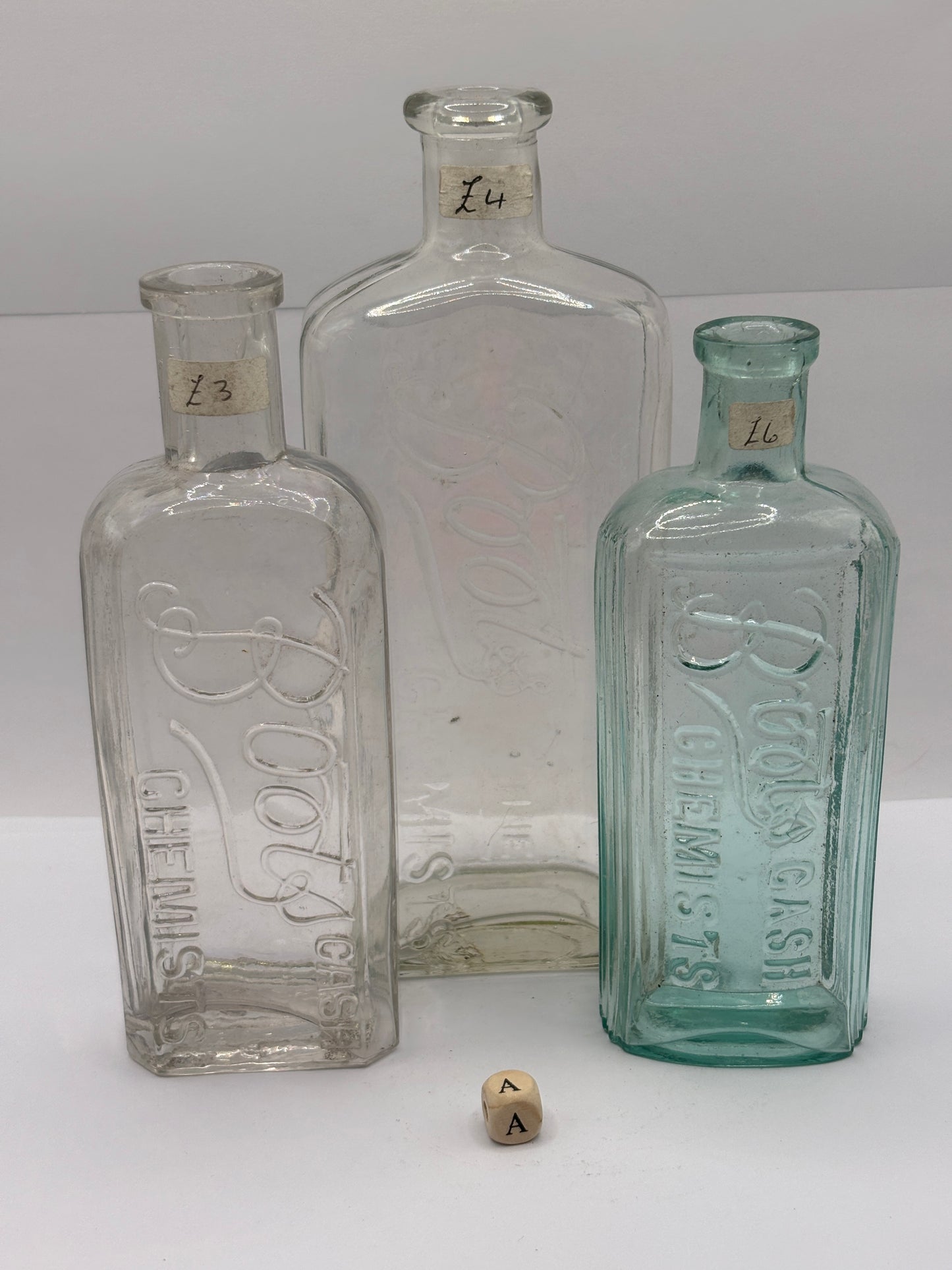 3 Old glass Boots cash chemists bottles (A)