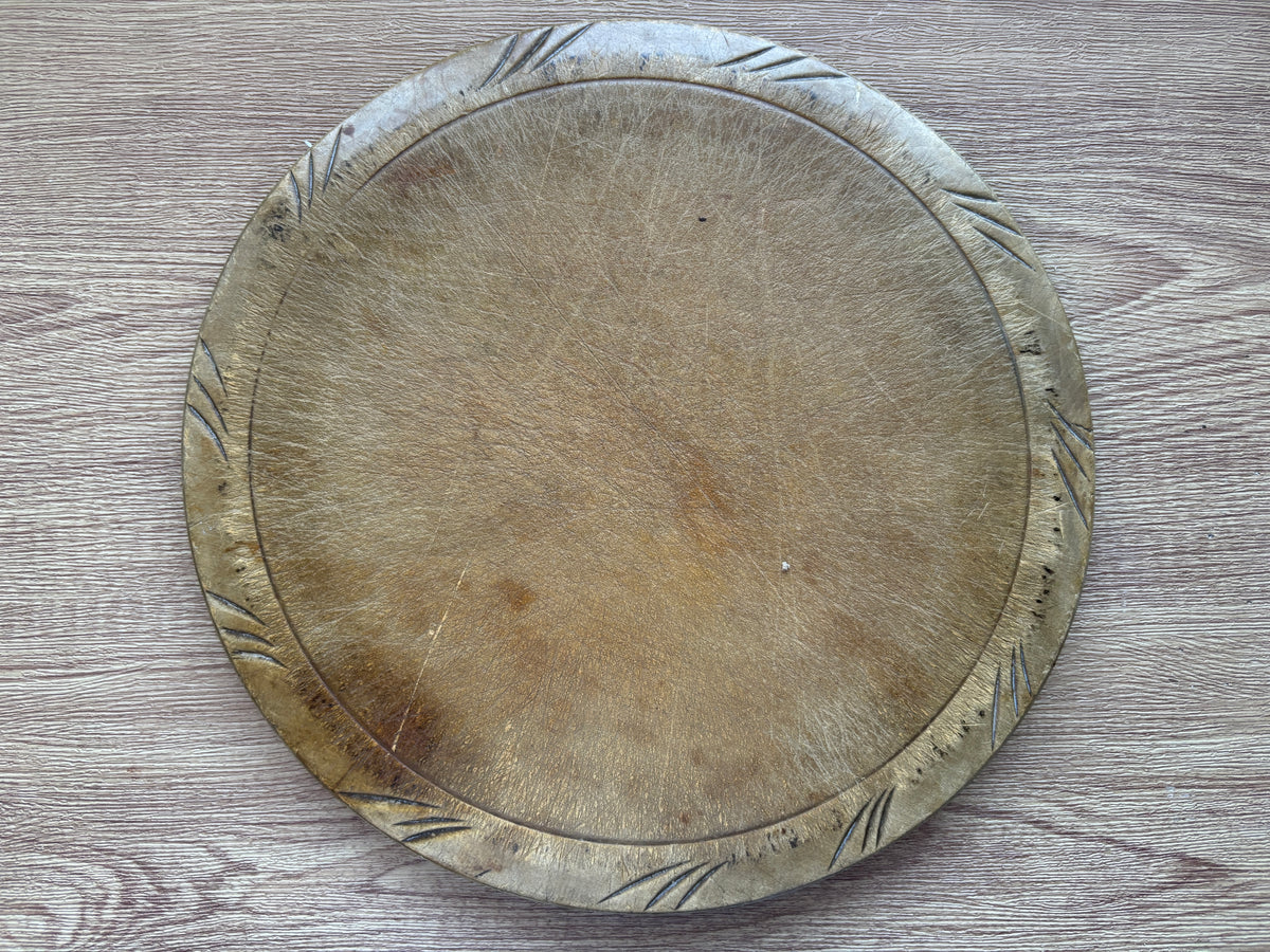 Old wooden carved bread board