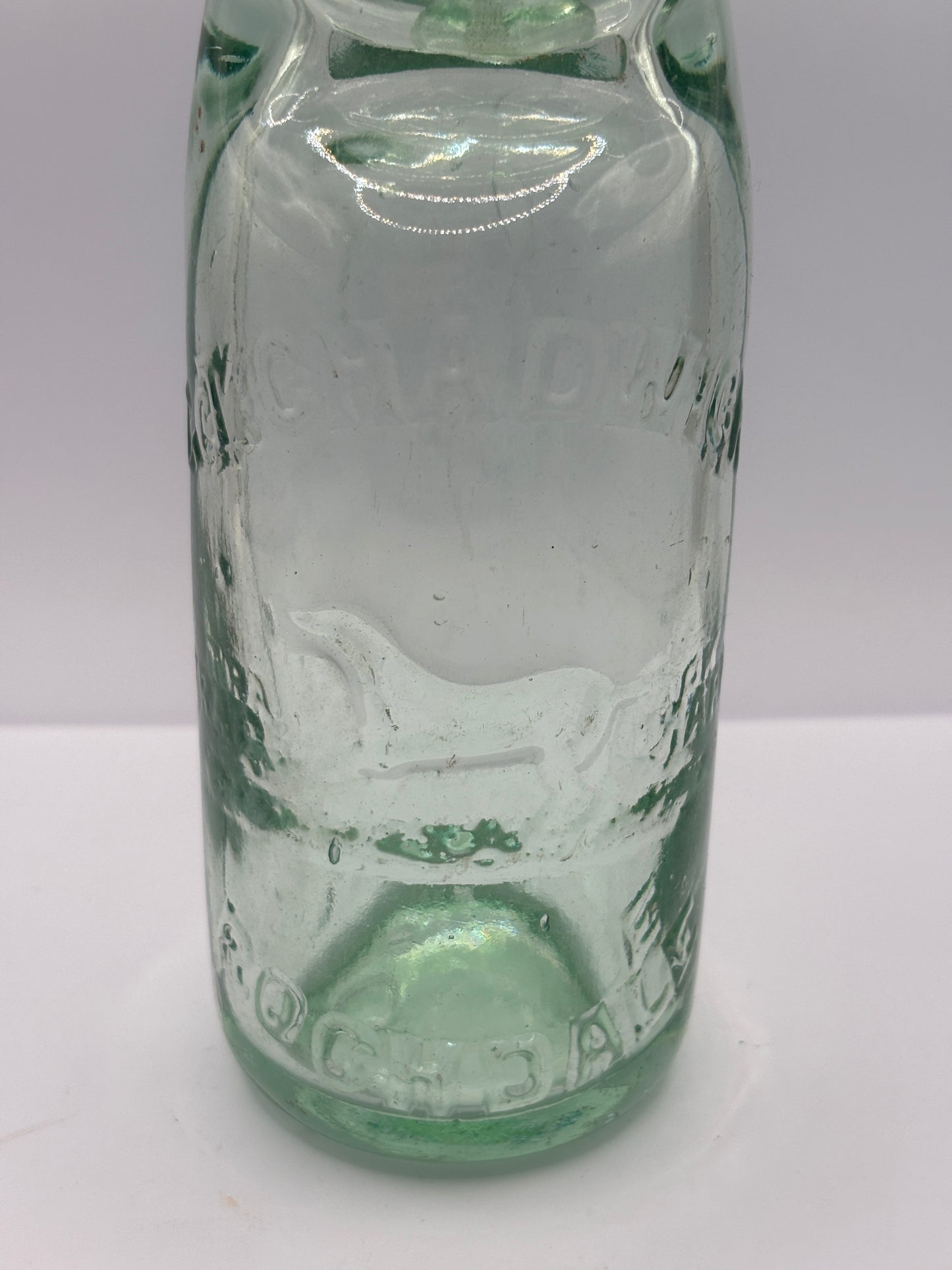 Old pictorial Rochdale codd bottle. Marble bottle