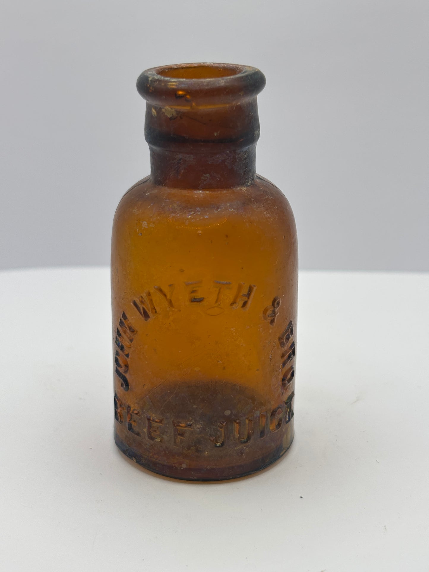 Old amber glass beef juice bottle