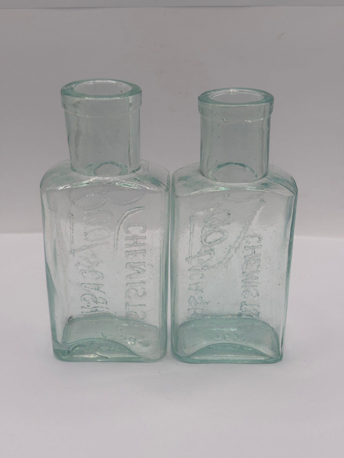 2 Old glass Boots cash chemists bottles