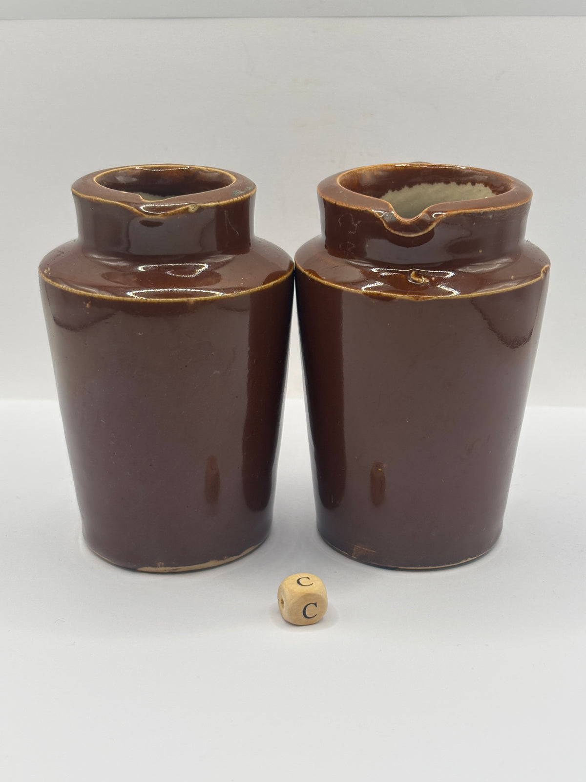 2 Old brown stoneware cream pots (C)
