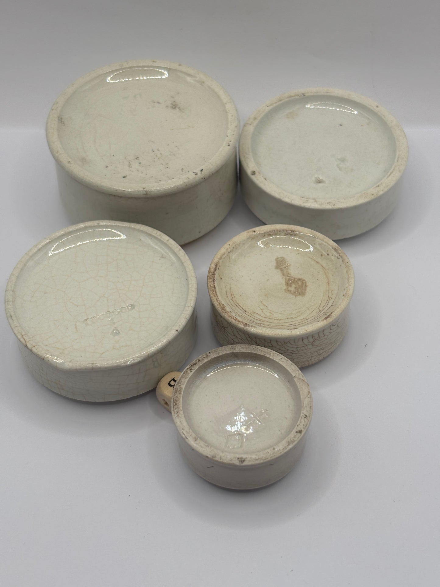 5 old pot lid bases, stackers, risers (B)